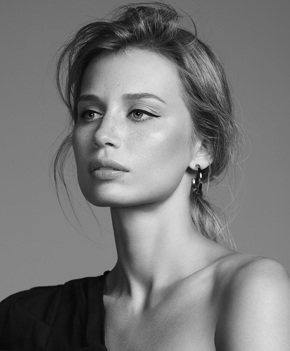 Black and white portrait of a woman.