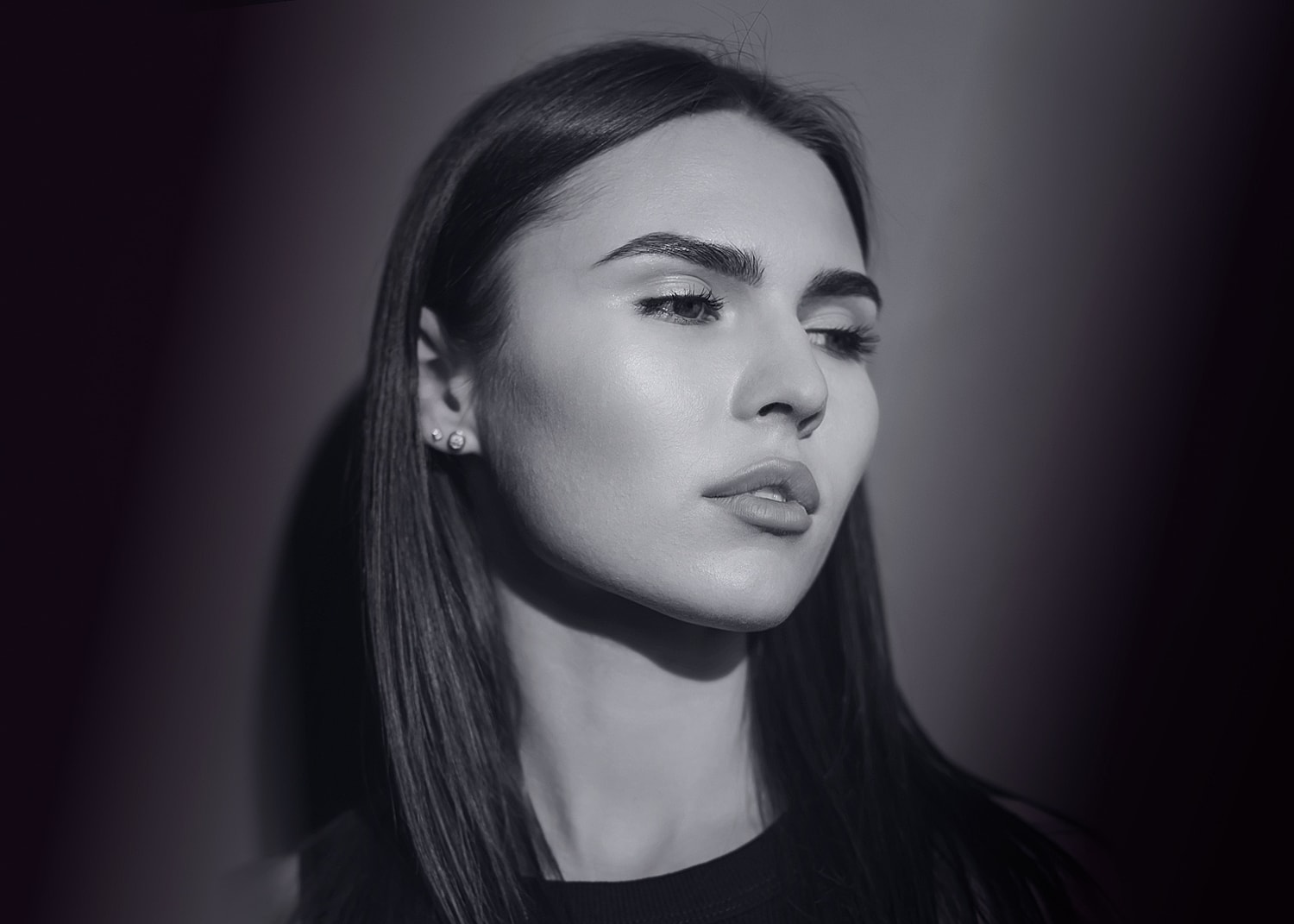 Black and white portrait of a woman.