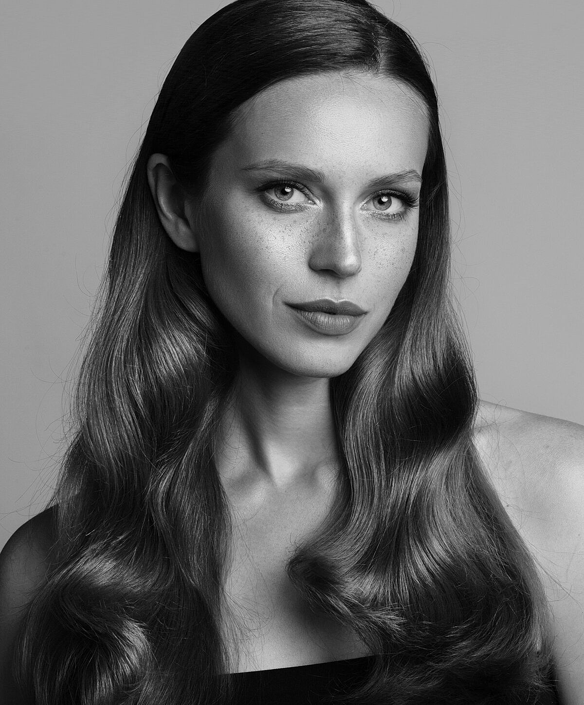 Black and white portrait of a woman.