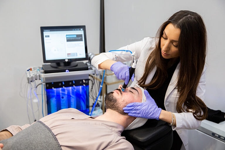 Skin treatment session in a clinic setting.