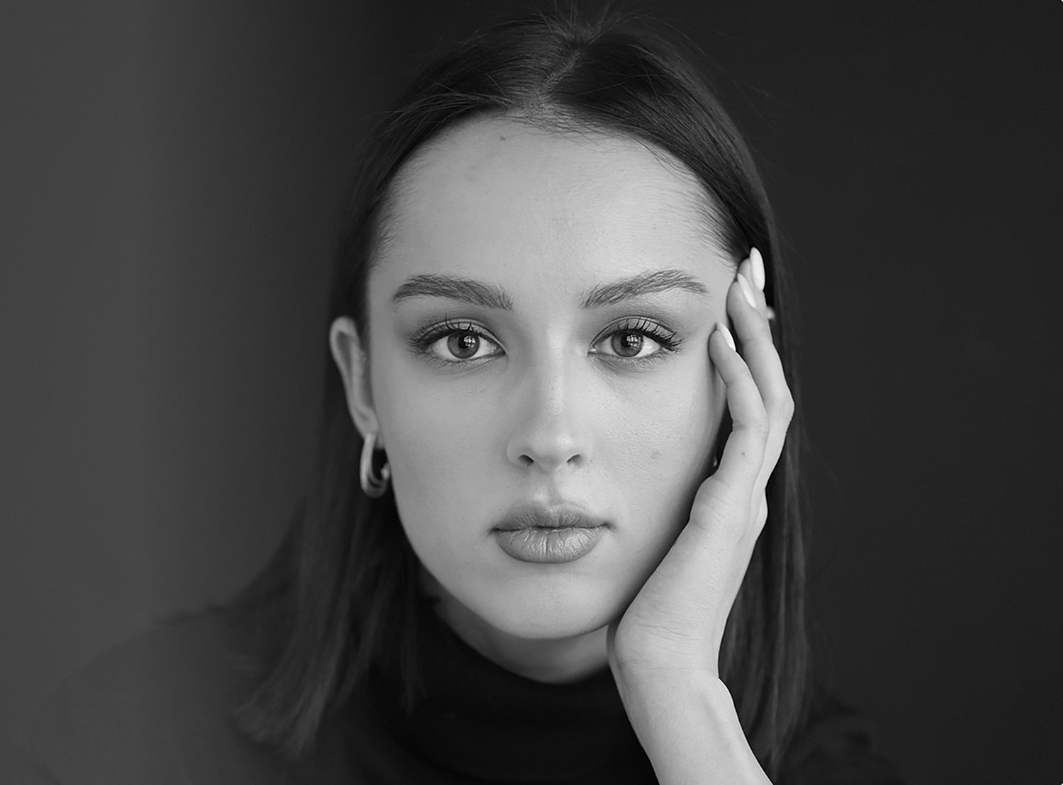 Black and white portrait of a young woman.