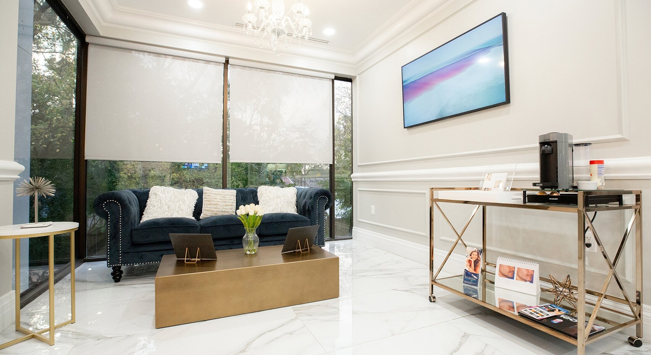 Modern waiting room with elegant decor and furniture.